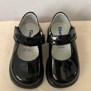 Titanium by Kinder Black Patent Mary Jane Shoes for girls.